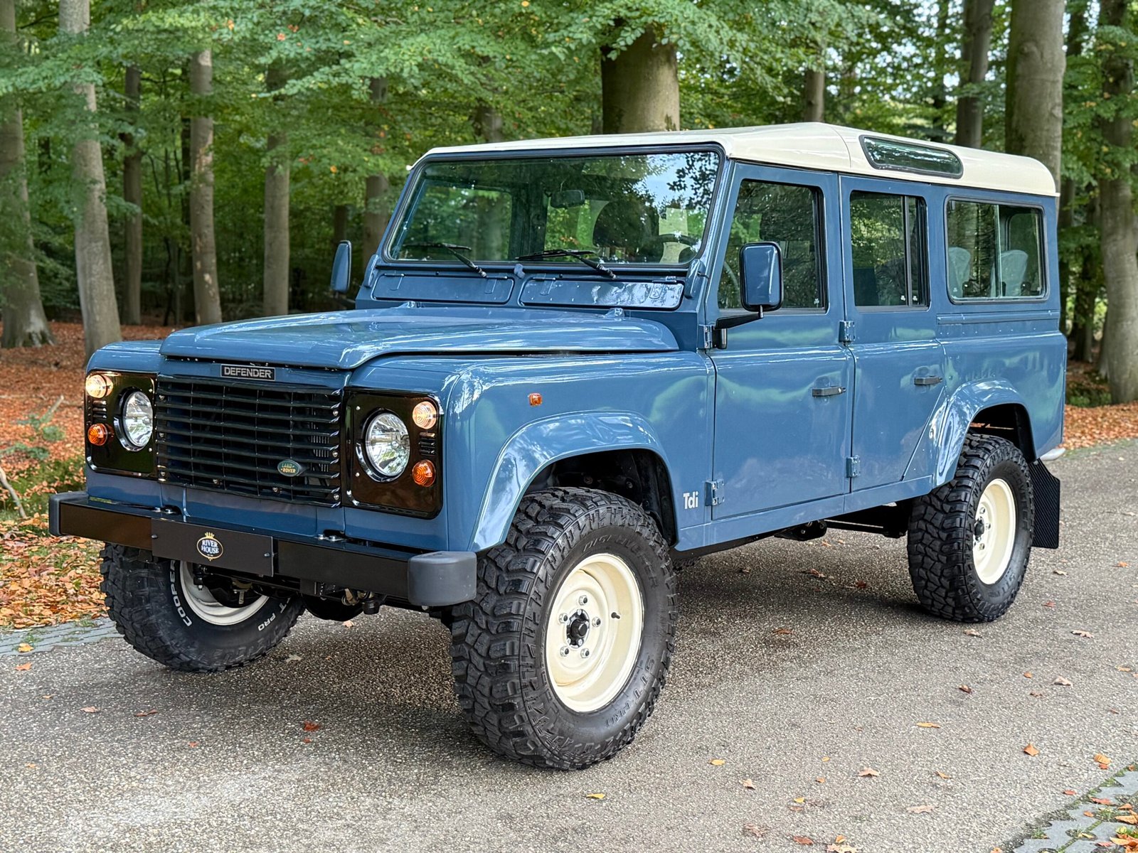 1997 Defender 110 Stationwagon in Arles Blue with Limestone roof and ANR NAS wheels