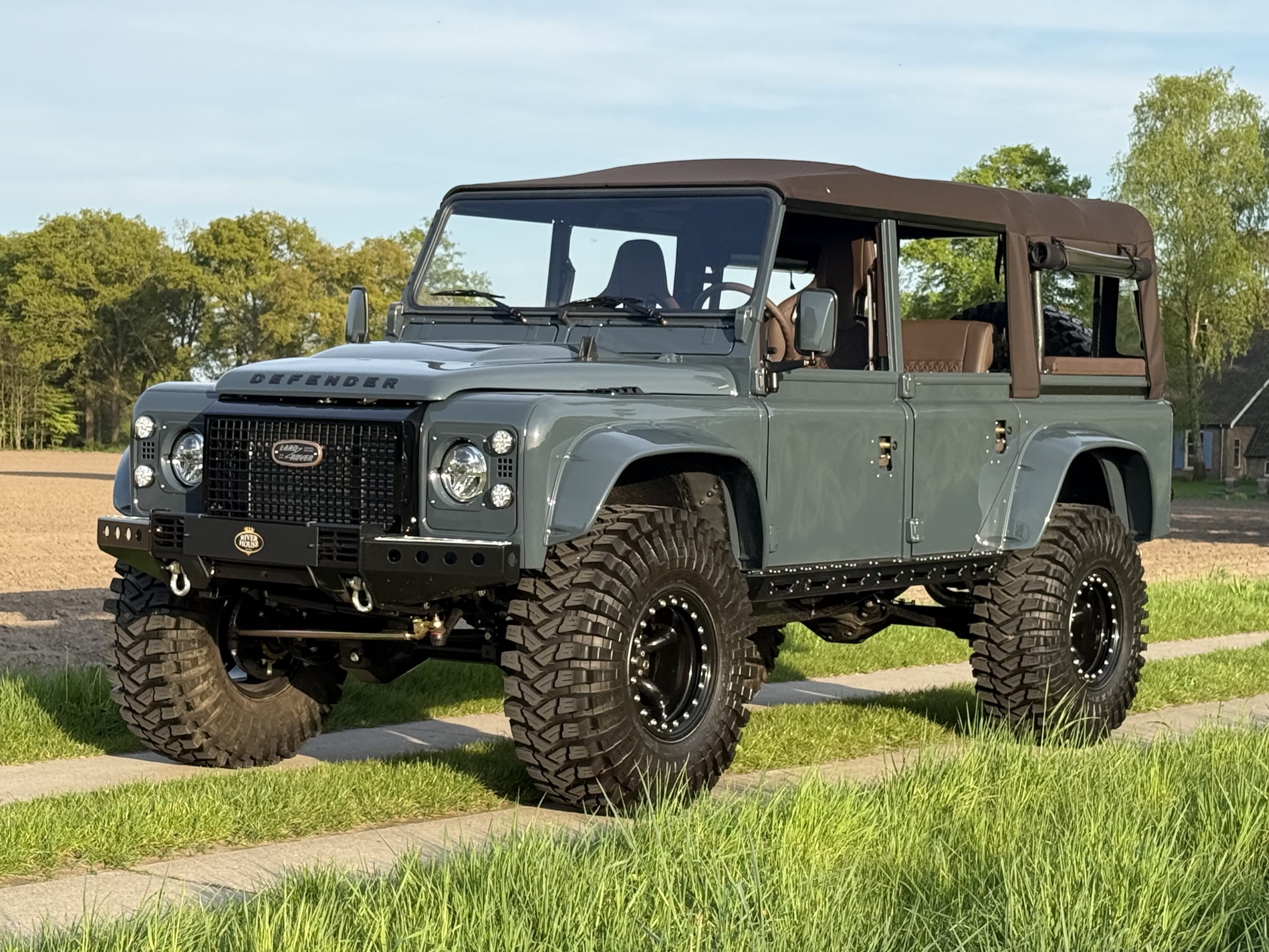 Green River House Defender photographed in open countryside